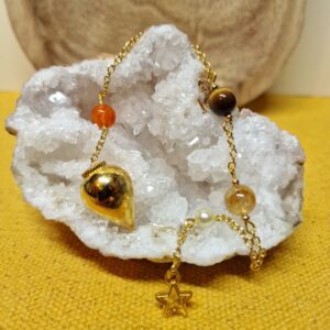 Image du Pendule Chemin de Vie 1 composé de Cornaline, d’Œil de Tigre et de Citrine, créé pour soutenir le courage, la clarté d’esprit et la réussite.